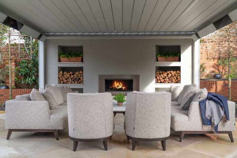 outdoor furniture set by fireplace