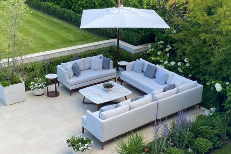 garden furniture set by lawn in Surrey country house