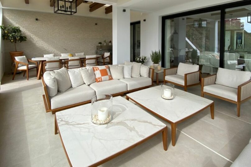 indoor white table, chairs and sofa at Spanish villa